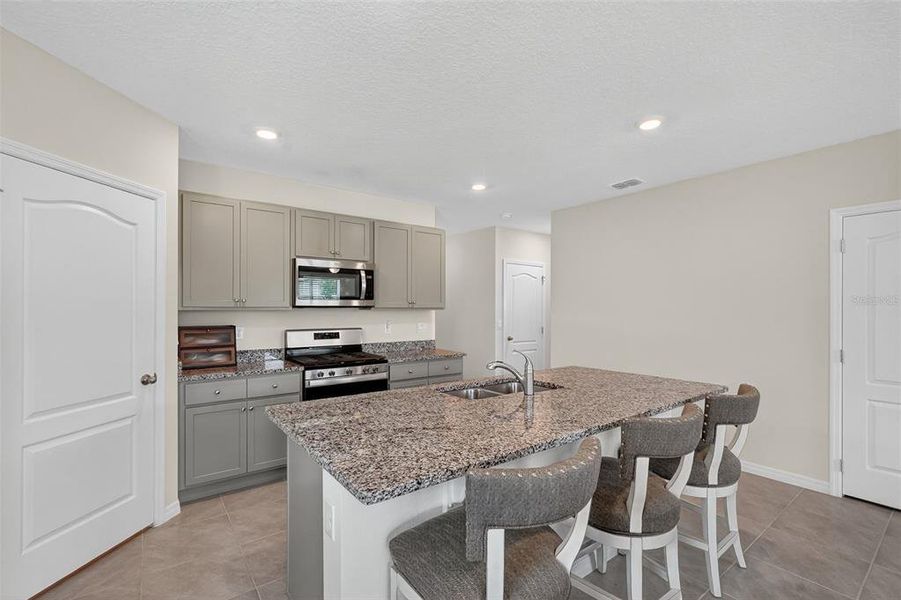 Furnished interior view inside a new home in , Okahumpka (Image 6).