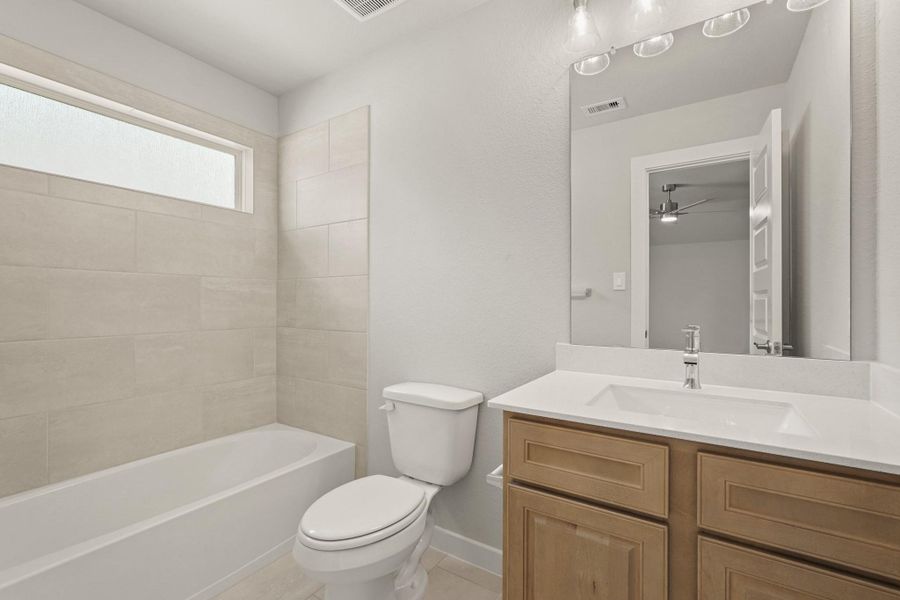 Furnished interior view inside a new home in Briarwood Crossing, Rosenberg (Image 13).