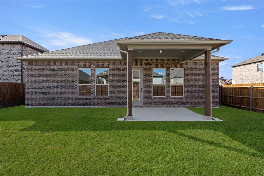 Exterior details and patio area of a home in Country Lakes, Argyle (Image 4).