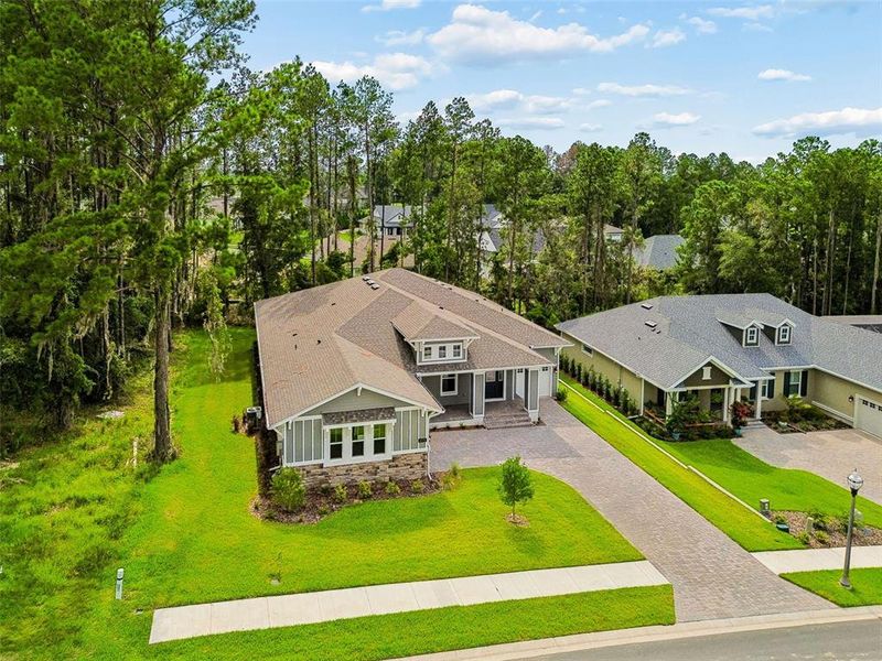 Front exterior of a new home in Southern Hills Plantation, Brooksville, FL, highlighting curb appeal (Image 2). Front exterior of a new home in Southern Hills Plantation, Brooksville, FL, highlighting curb appeal (Image 2).