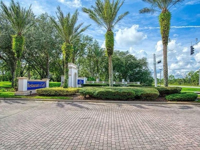 Front exterior of a new home in Links Terrace, Daytona Beach, FL, highlighting curb appeal (Image 11).
