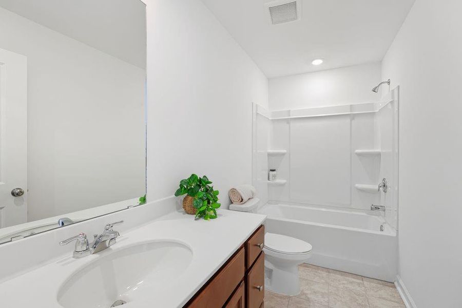 Furnished interior view inside a new home in Windance Lake, Loganville (Image 31).