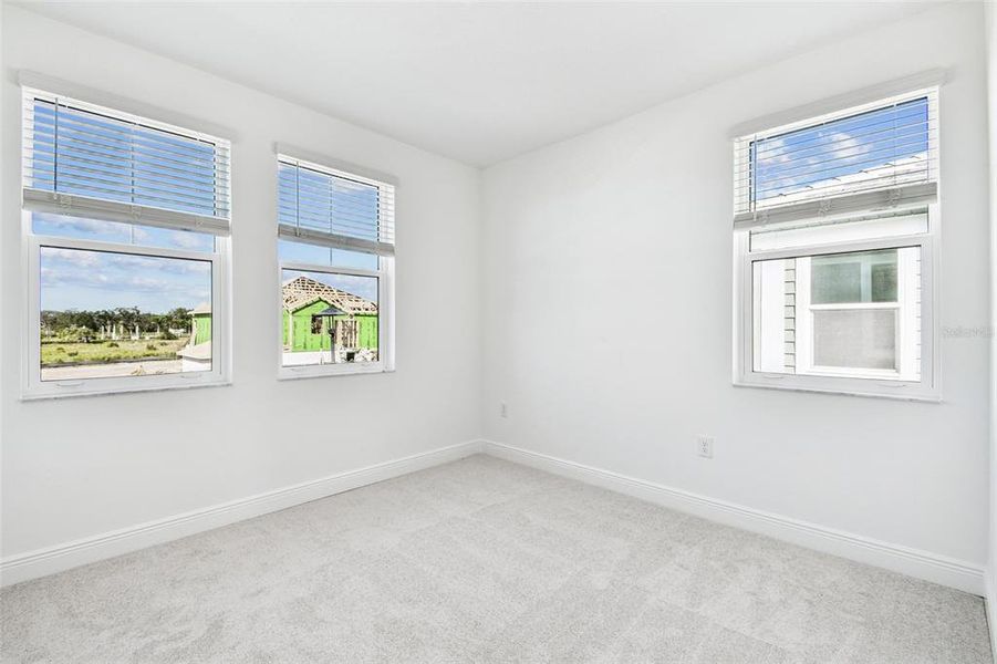 Spacious, unfurnished interior of a new home in Hawkstone, Sarasota (Image 49).