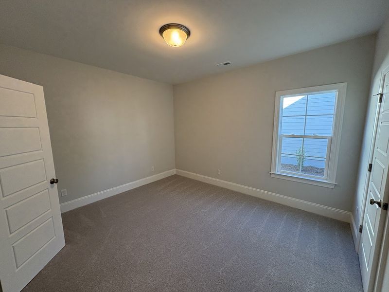 Spacious, unfurnished interior of a new home in Riverside Cove, Wilmington (Image 44).