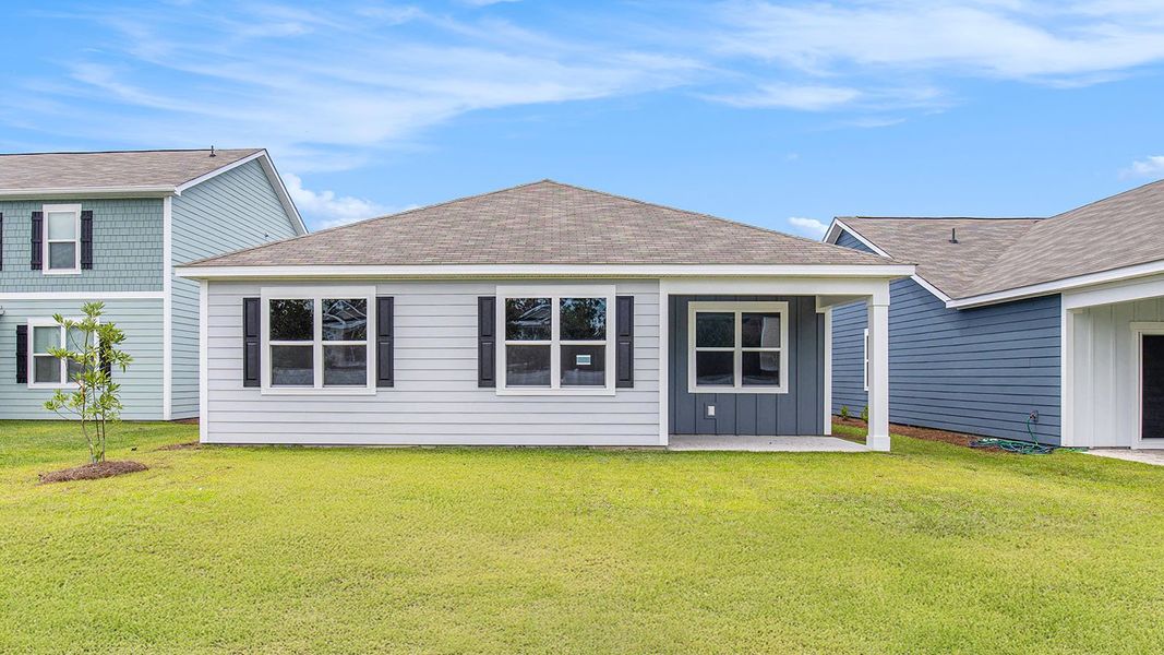 Front exterior of a new home in Auberon Woods, Conway, SC, highlighting curb appeal (Image 17).