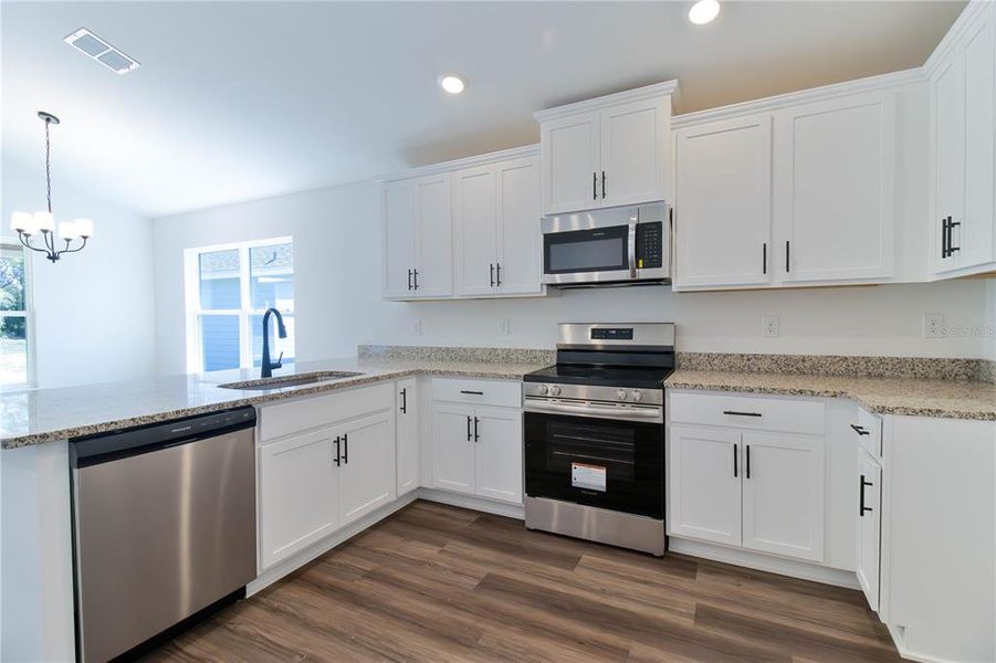Furnished interior view inside a new home in Briarwood, Alachua (Image 6).