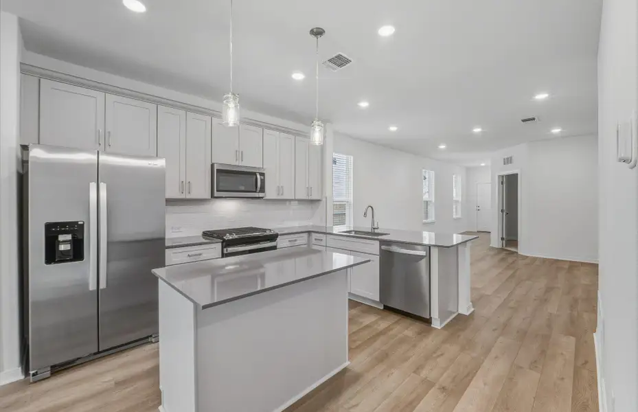 Furnished interior view inside a new home in Crosswinds, Kyle (Image 6). Furnished interior view inside a new home in Crosswinds, Kyle (Image 6).