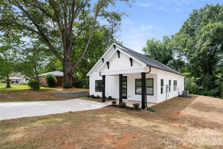 Front exterior of a new home in , Stanley, NC, highlighting curb appeal (Image 22). Front exterior of a new home in , Stanley, NC, highlighting curb appeal (Image 22).