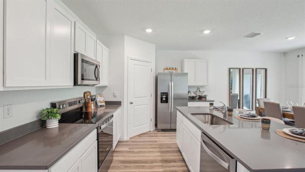Furnished interior view inside a new home in Angeline, Land O' Lakes (Image 7).