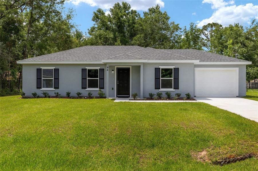 Front exterior of a new home in , Ocala, FL, highlighting curb appeal (Image 19).