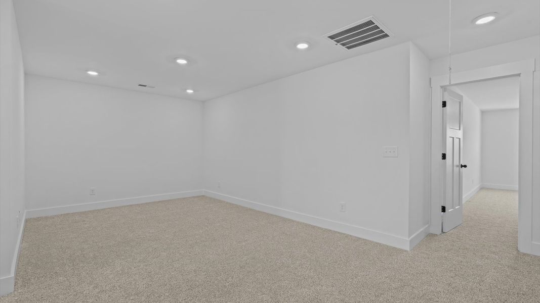 Memorable upstairs loft with plush carpeting and a bright, welcoming atmosphere