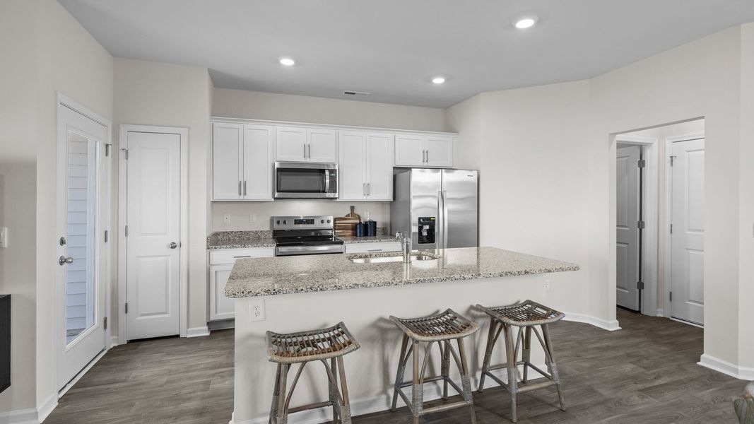 Furnished interior view inside a new home in The Townes at Ridgewood Farms, Winterville (Image 9).