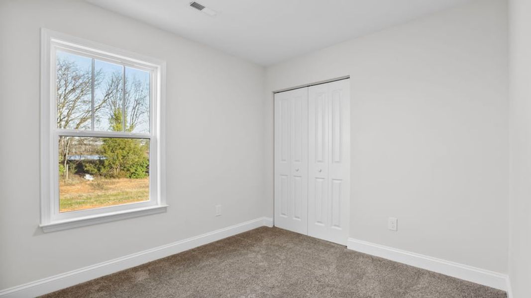 Spacious, unfurnished interior of a new home in Edgewood Estates, Greenville (Image 25).