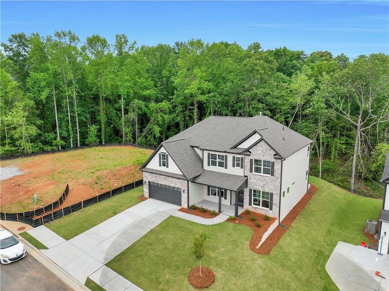 Front exterior of a new home in Arbor West, Dawsonville, GA, highlighting curb appeal (Image 24).