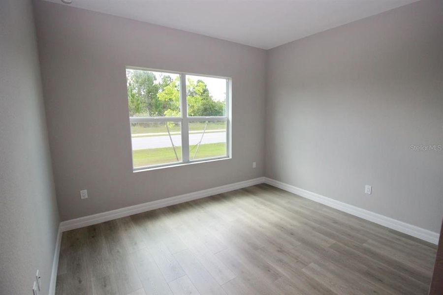 Spacious, unfurnished interior of a new home in , Port Charlotte (Image 19).