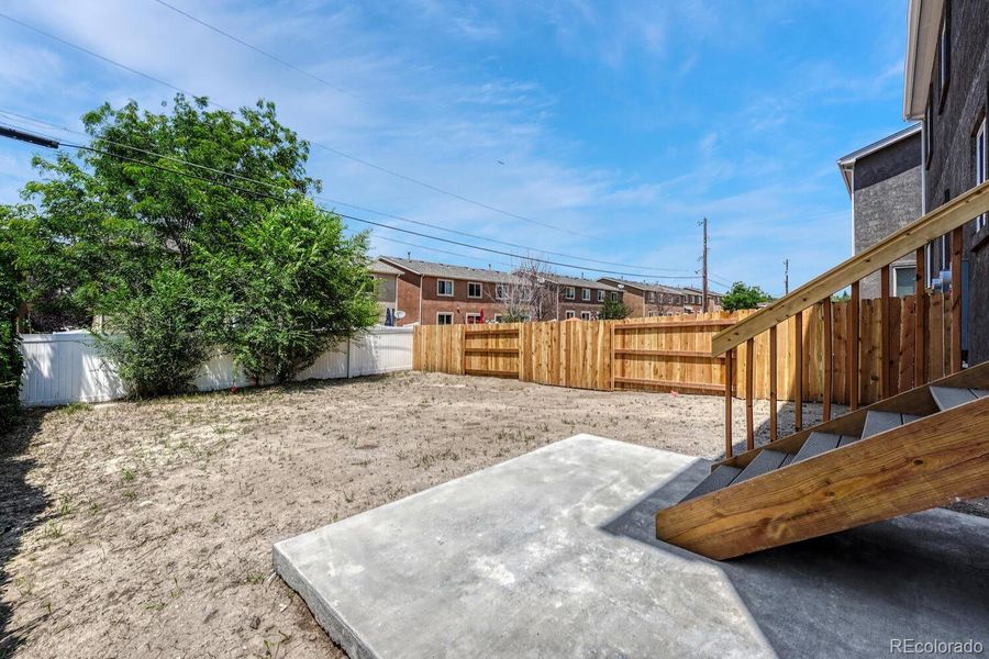 Landscaping and auto sprinklers are included.