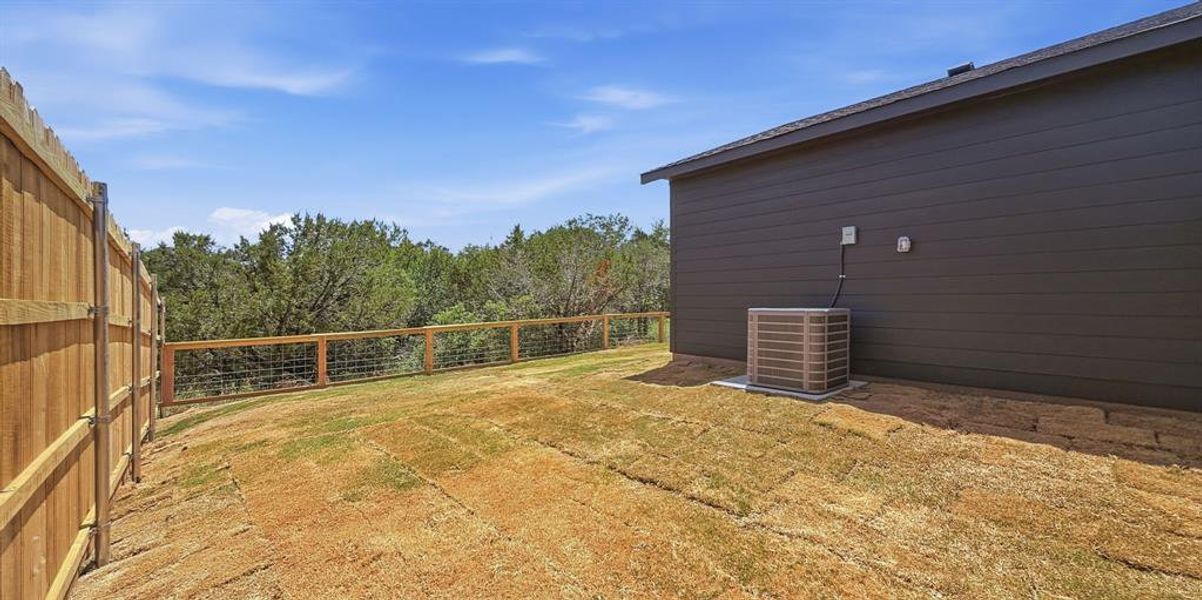 Exterior details and patio area of a home in , Granbury (Image 23).
