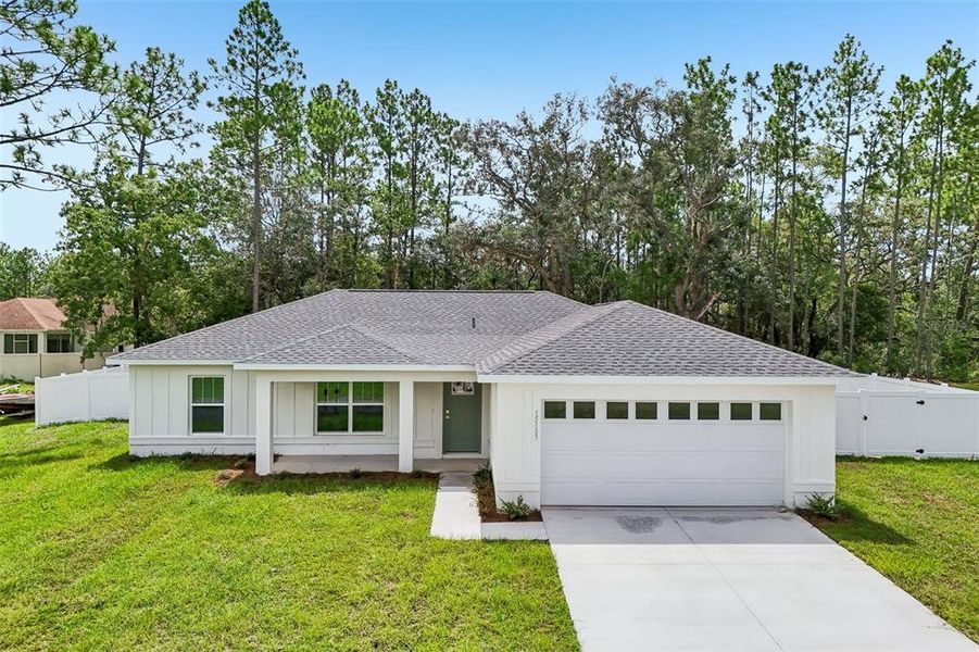 Front exterior of a new home in , Ocala, FL, highlighting curb appeal (Image 22).