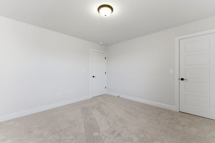 Spacious, unfurnished interior of a new home in Blacksmith, Stokesdale (Image 84).