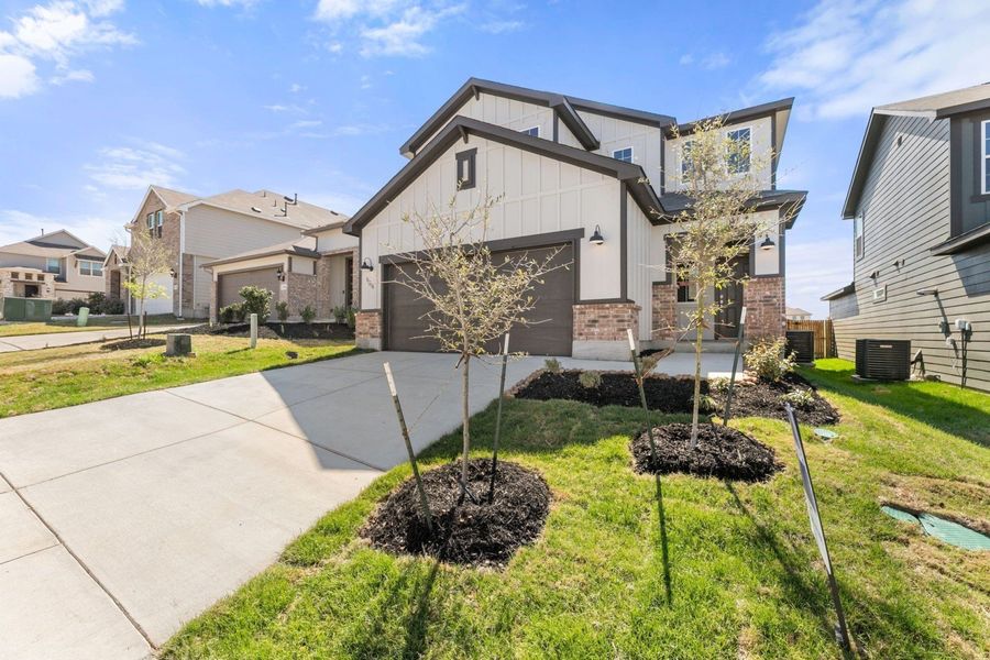 Representative exterior photo of a completed home built from the Maverick by Hakes Brothers in Highland Ridge, New Braunfels, TX (Image 2). Representative exterior photo of a completed home built from the Maverick by Hakes Brothers in Highland Ridge, New Braunfels, TX (Image 2).