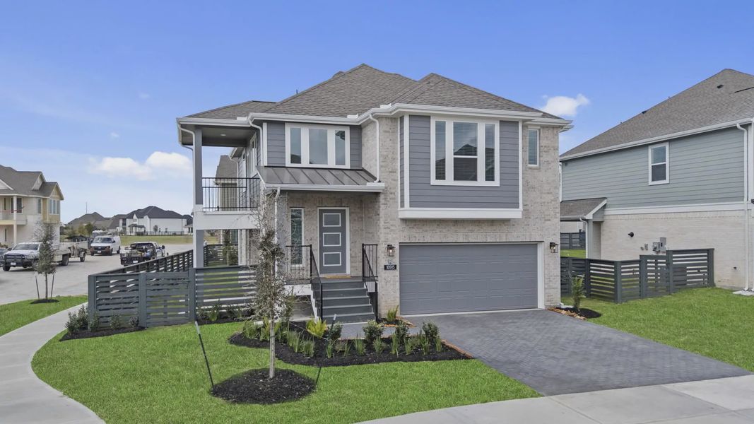 Representative exterior photo of a completed home built from the Oakdale by Chesmar Homes in Bridgeland, Elgin, TX (Image 22).