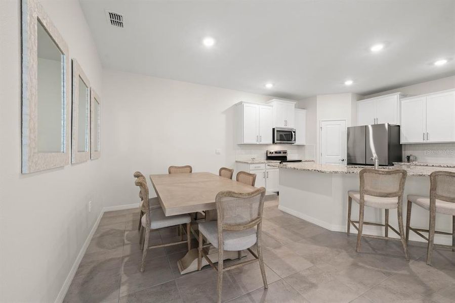 Furnished interior view inside a new home in Star Farms at Lakewood Ranch, Bradenton (Image 11).