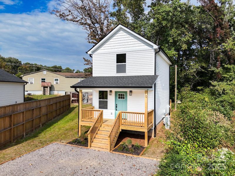 Front exterior of a new home in , Marion, NC, highlighting curb appeal (Image 20).