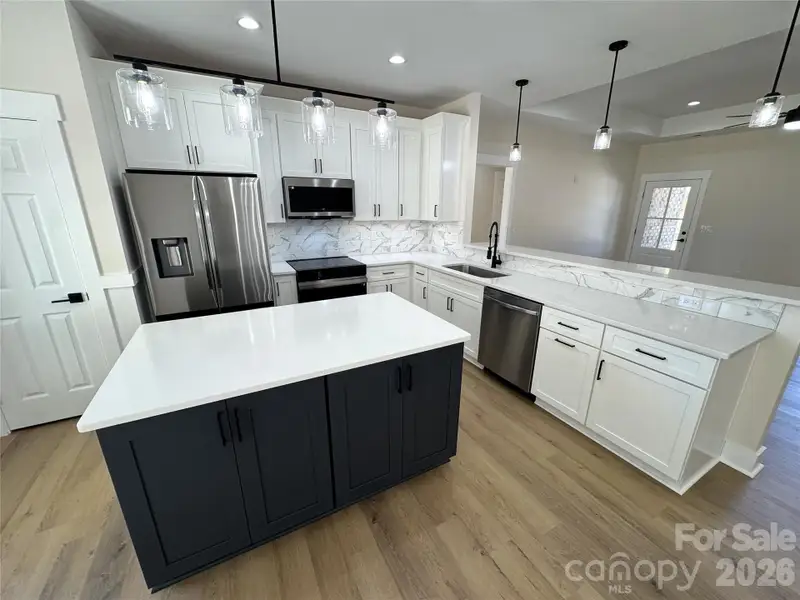 Furnished interior view inside a new home in , Albemarle (Image 6).