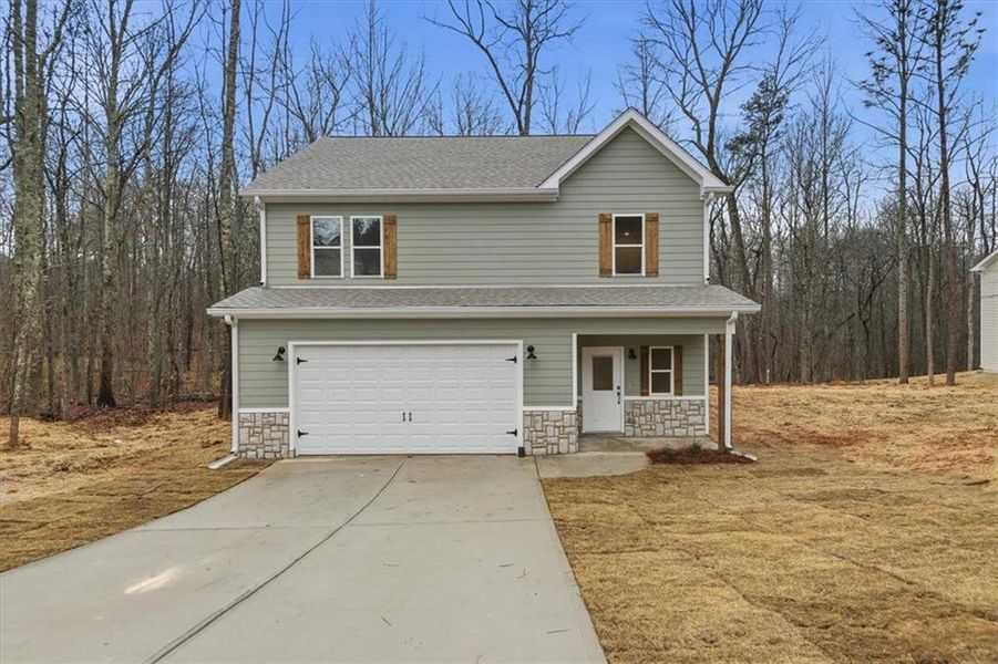 Front exterior of a new home in , Carrollton, GA, highlighting curb appeal (Image 24).