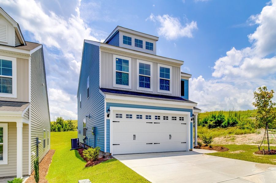 Front exterior of a new home in Ellington, Elgin, SC, highlighting curb appeal (Image 20).