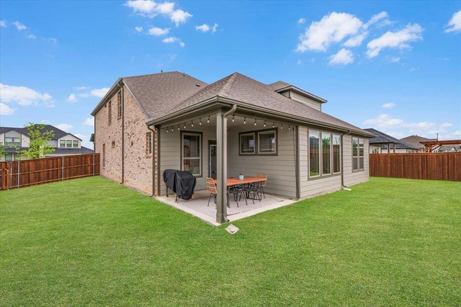 Exterior details and patio area of a home in , Fort Worth (Image 26).