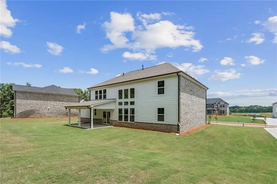 Exterior details and patio area of a home in Windsong Estates, McDonough (Image 3).