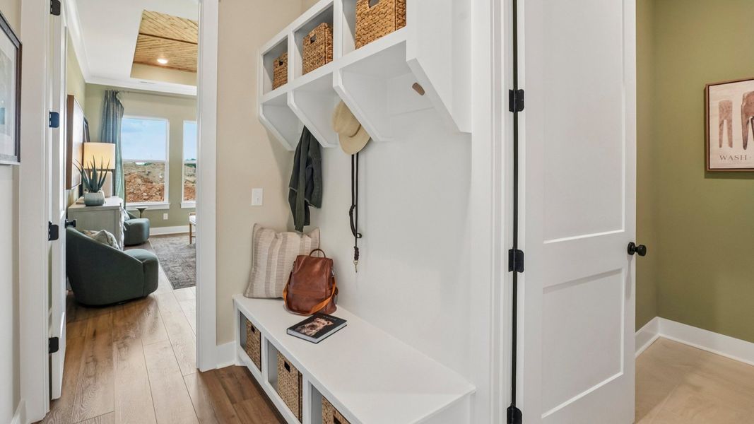 Dedicated drop-zone with access to primary suite and dedicated laundry room Dedicated drop-zone with access to primary suite and dedicated laundry room