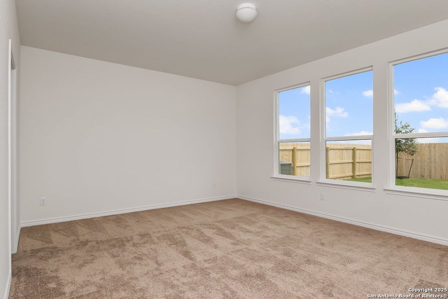 Spacious, unfurnished interior of a new home in Preserve at Culebra - Classic Collection, San Antonio (Image 5).