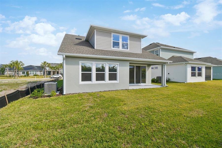 Exterior details and patio area of a home in Waterset Tradition Series, Apollo Beach (Image 22).