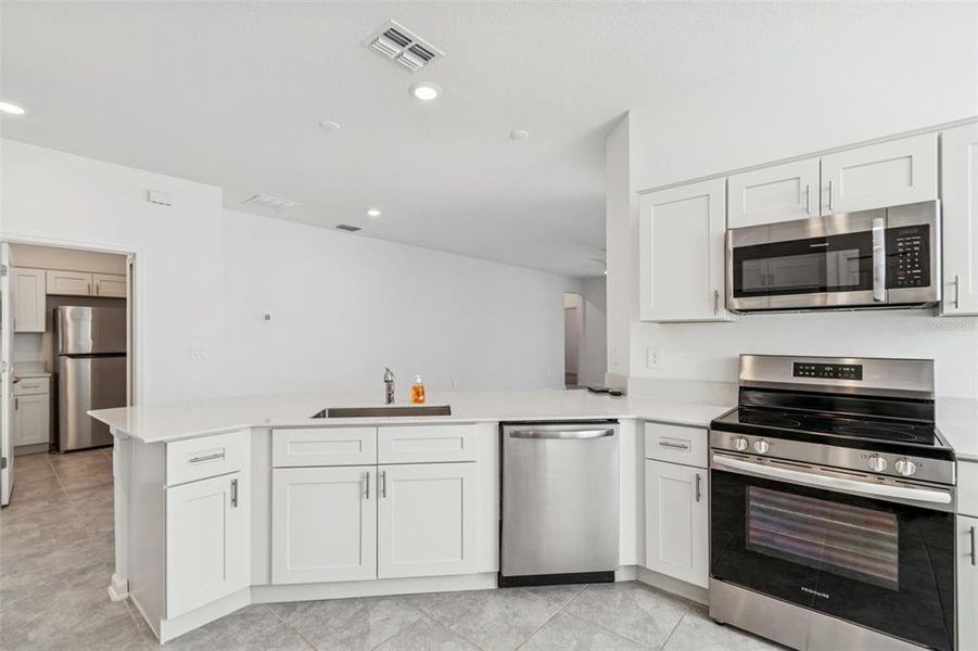 Furnished interior view inside a new home in Ranches at Lake McLeod, Eagle Lake (Image 12).