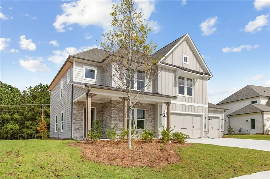 Front exterior of a home in the Ashbury Commons community, located in Powder Springs, GA (Image 1).