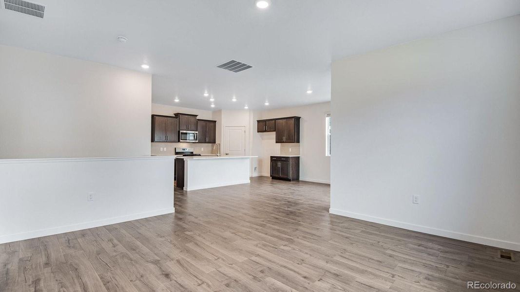 Spacious, unfurnished interior of a new home in Trails at Crowfoot, Parker (Image 25).