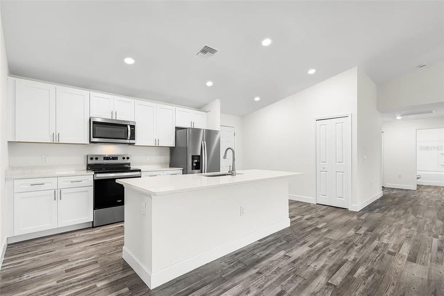 Furnished interior view inside a new home in , Cape Coral (Image 3). Furnished interior view inside a new home in , Cape Coral (Image 3).