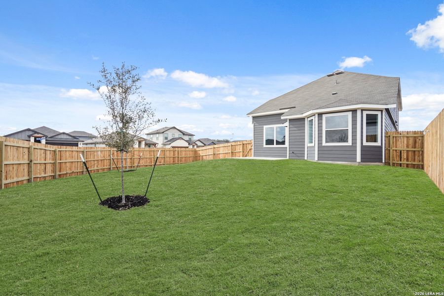 Exterior details and patio area of a home in Abbott Place, St. Hedwig (Image 3).