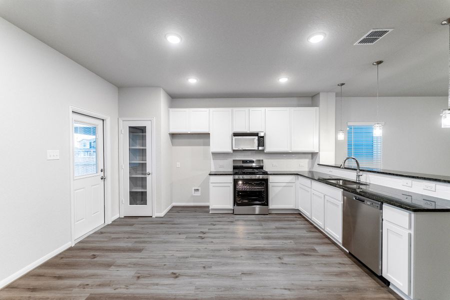 Furnished interior view inside a new home in Hennersby Hollow, San Antonio (Image 5).