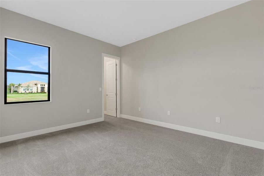 Bedroom 2 with walk in closet.