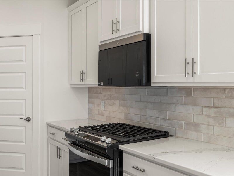 Furnished interior view inside a new home in The Coves at Lakes of Cane Bay, Summerville (Image 5). Furnished interior view inside a new home in The Coves at Lakes of Cane Bay, Summerville (Image 5).
