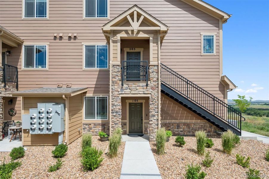 Front exterior of a new home in Chatfield Bluffs, Littleton, CO, highlighting curb appeal (Image 23).