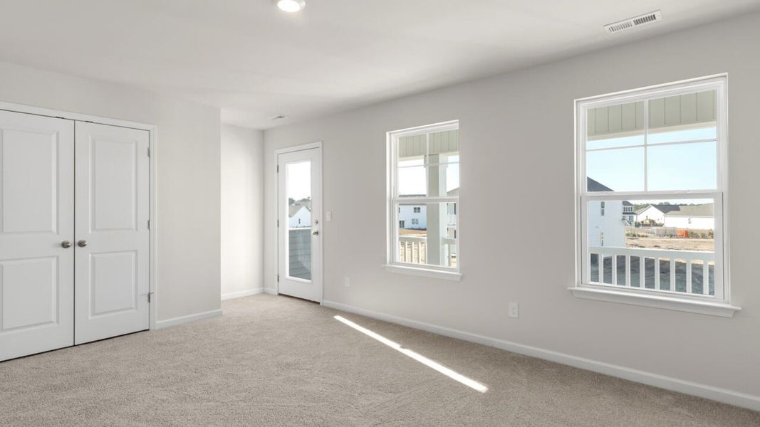 Spacious, unfurnished interior of a new home in Indigo Preserve, Leland (Image 39).