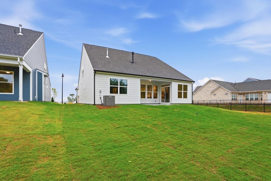 Exterior details and patio area of a home in Founders Landing | 55+ Community, Gastonia (Image 18).