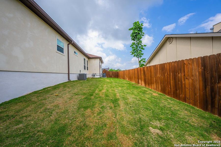 Exterior details and patio area of a home in , Kerrville (Image 23).