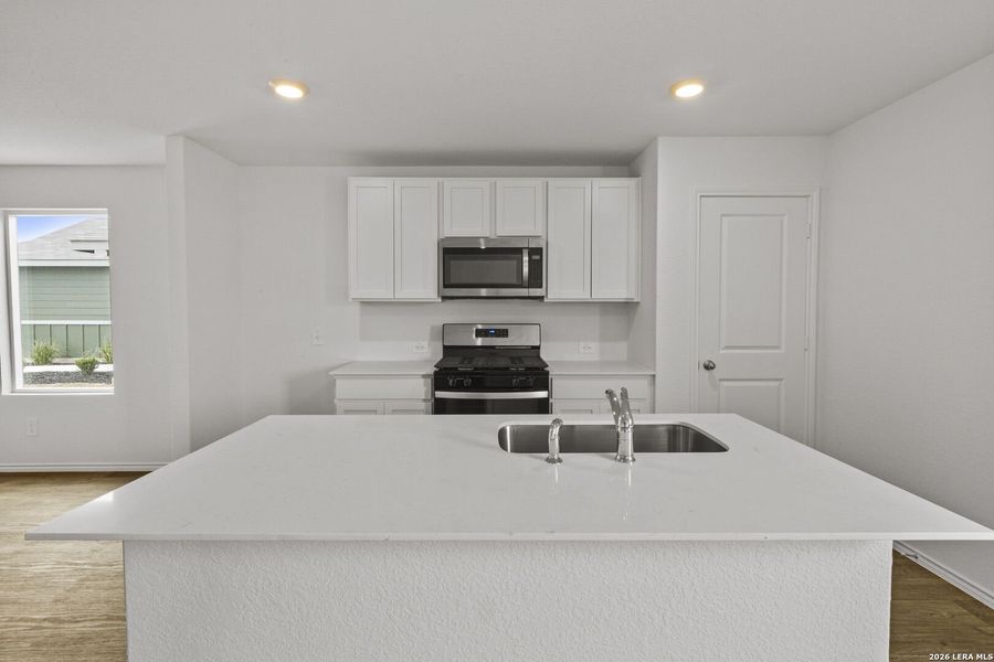 Furnished interior view inside a new home in Avenida, Converse (Image 10).