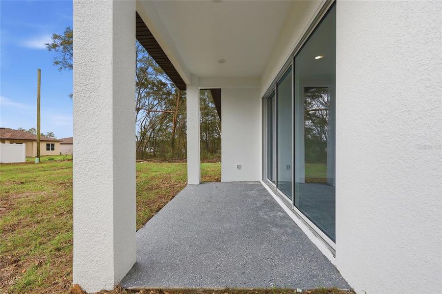 Exterior details and patio area of a home in , Ocala (Image 3).