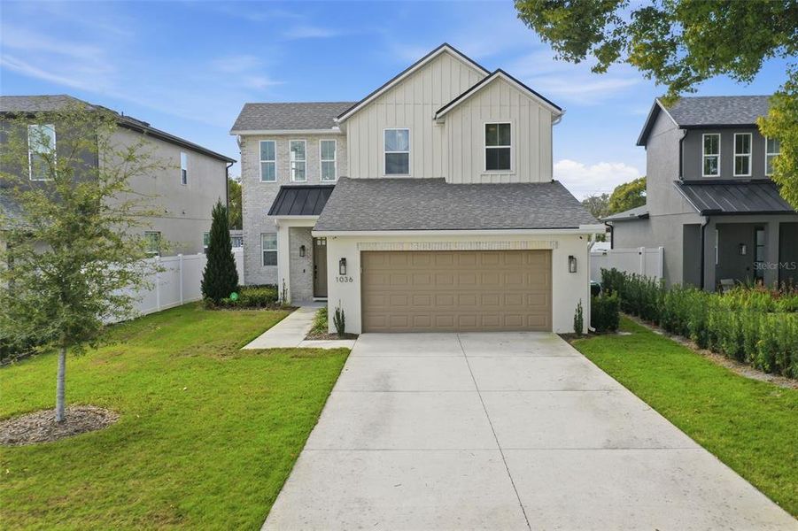 Front exterior of a new home in , Orlando, FL, highlighting curb appeal (Image 1). Front exterior of a new home in , Orlando, FL, highlighting curb appeal (Image 1).
